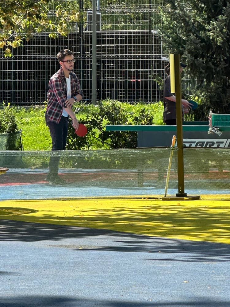 Playing table tennis on an outdoor table