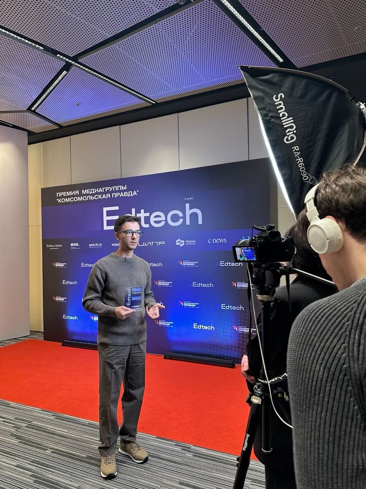 An on-camera interview at the Edtech award press wall